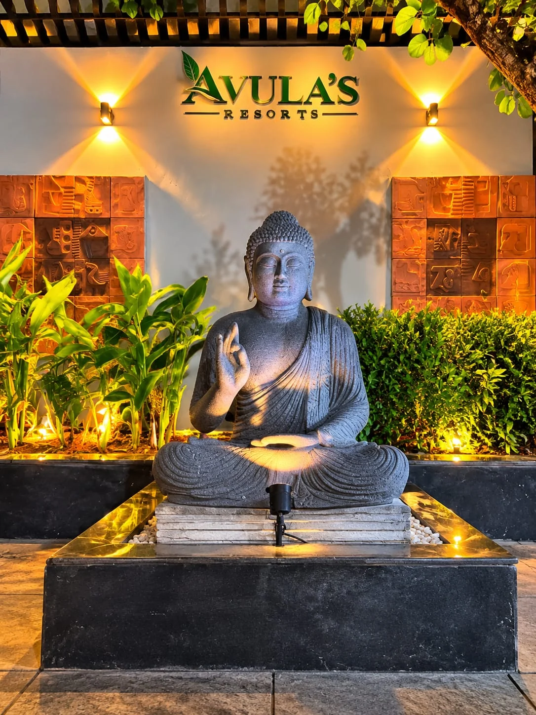 Decorative statue and landscaped garden at the resort