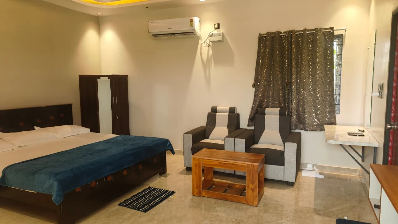 Seating area inside an AVULA'S RESORTS guest room